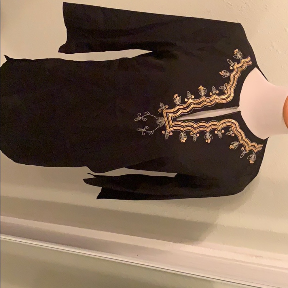 Black shirt size small. Good condition.